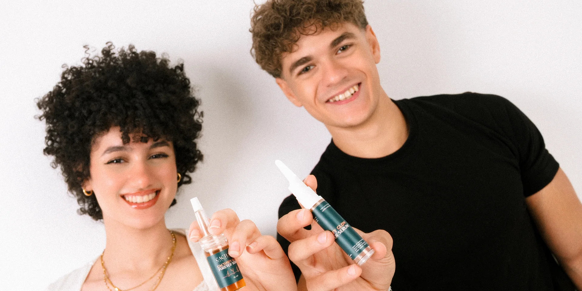Cactusfy models presenting Glow Forever Serum and its applicator
