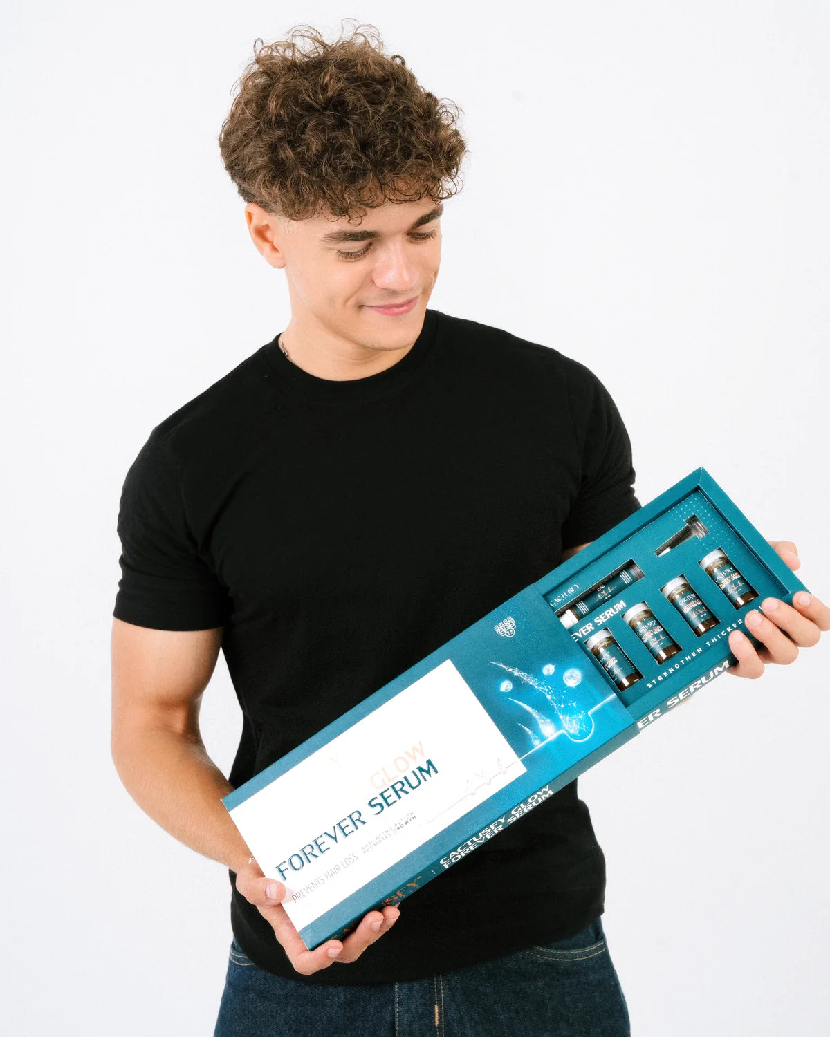 Model presenting the complete Cactusfy Glow Forever Serum box