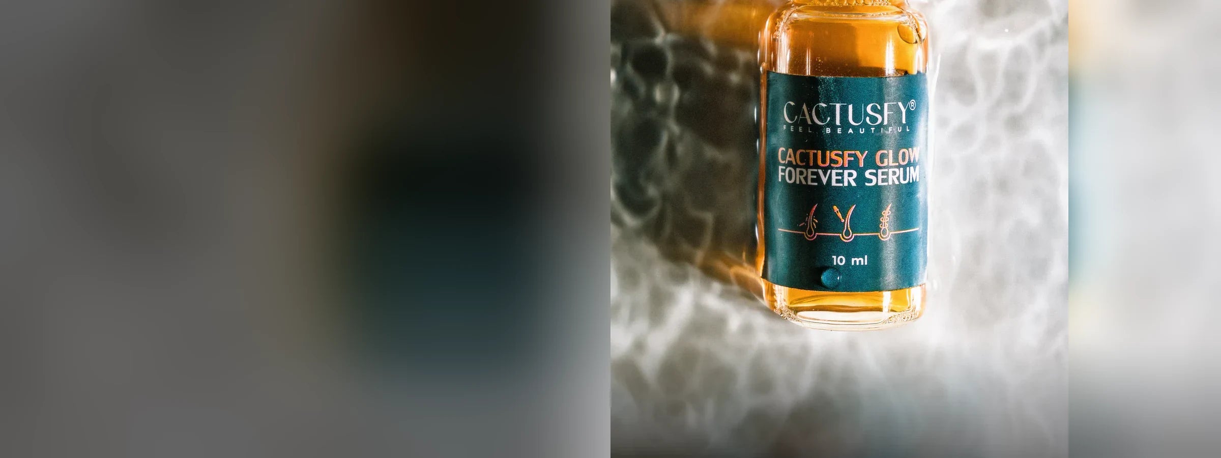 Cactusfy Glow Forever Serum vial in an amber editorial scene